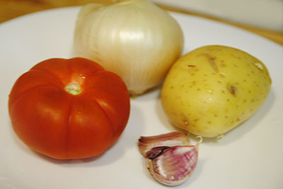 Patata, tomate, ajo y cebolla al natural